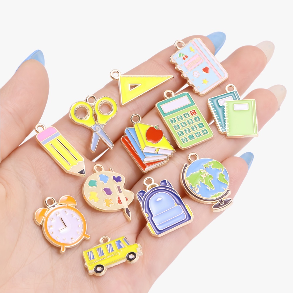 10 個かわいいブック鉛筆定規バックパックバスエナメルペンダ - Jewelry Making Guide Book のレビューと価格